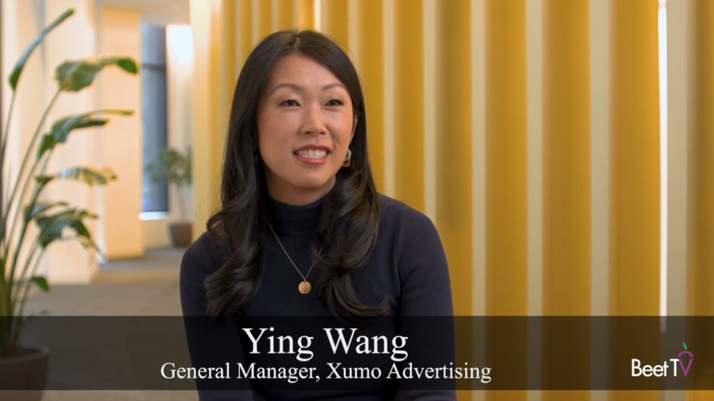 Xumo TV home screen displaying streaming apps and targeted ad integrations