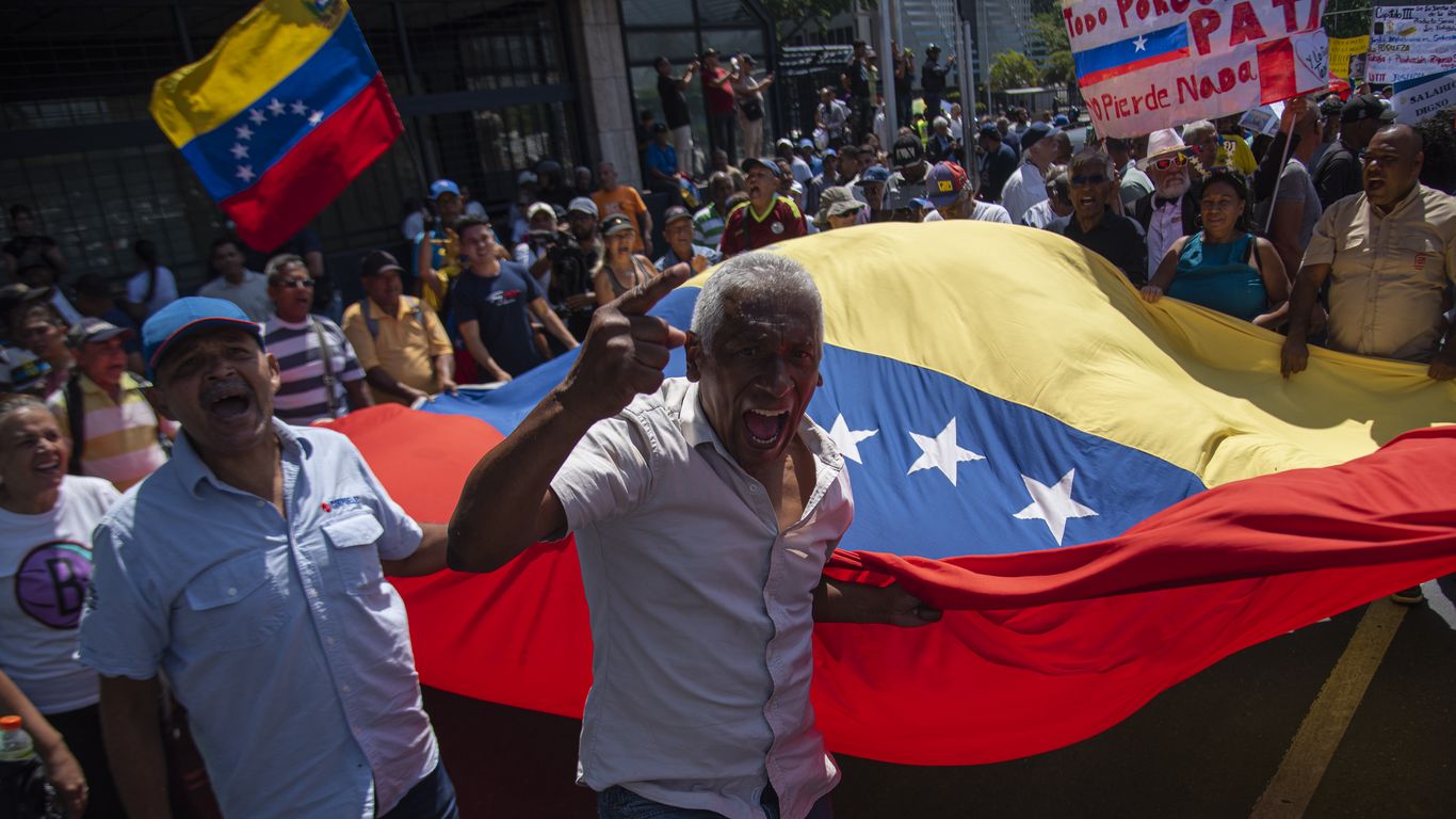 US Treasury building with Venezuelan flag and oil barrels in foreground, symbolizing sanctions relief