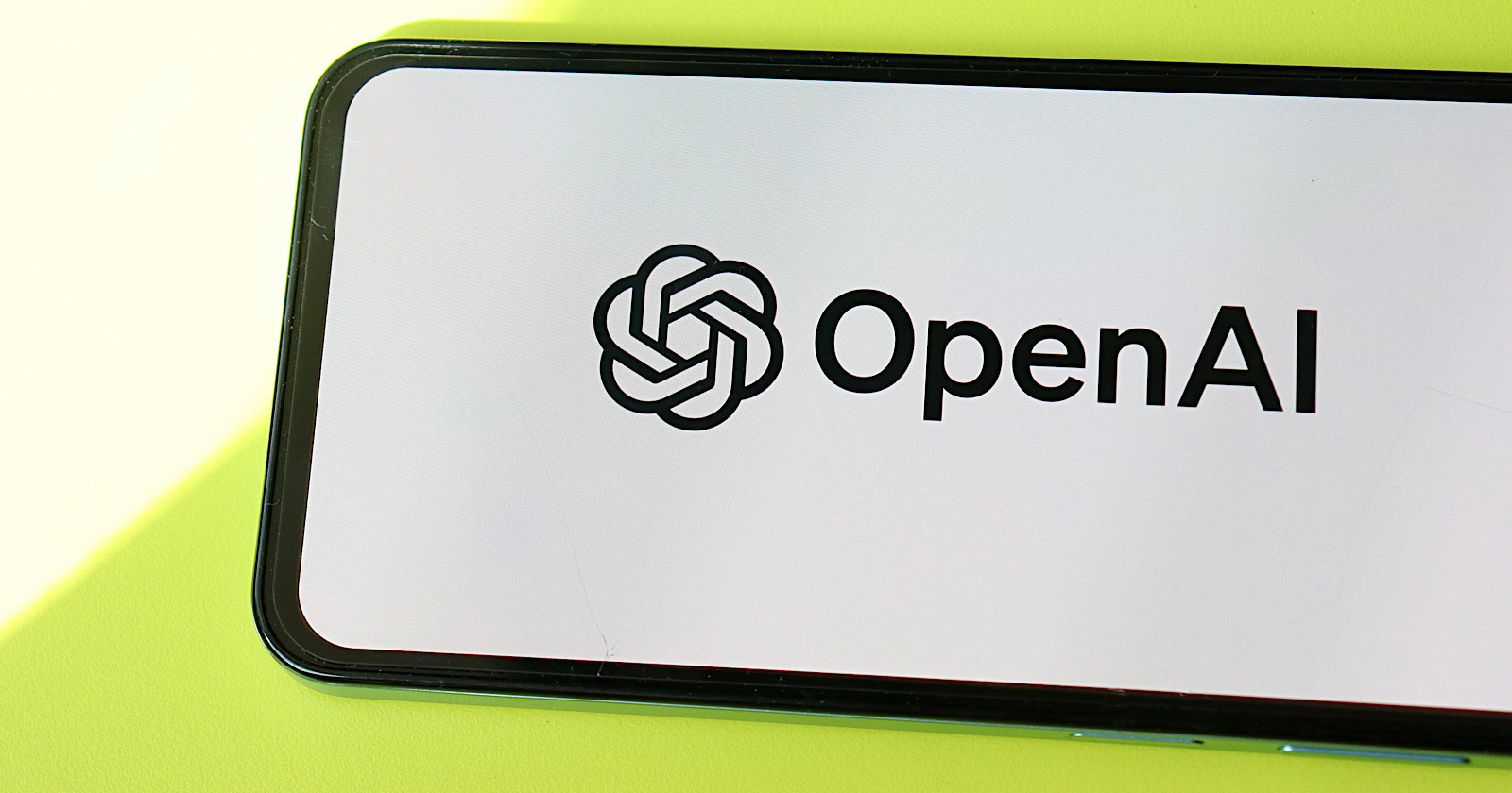 A stylized graphic representing a computer bot or crawler, with the OpenAI logo subtly incorporated.