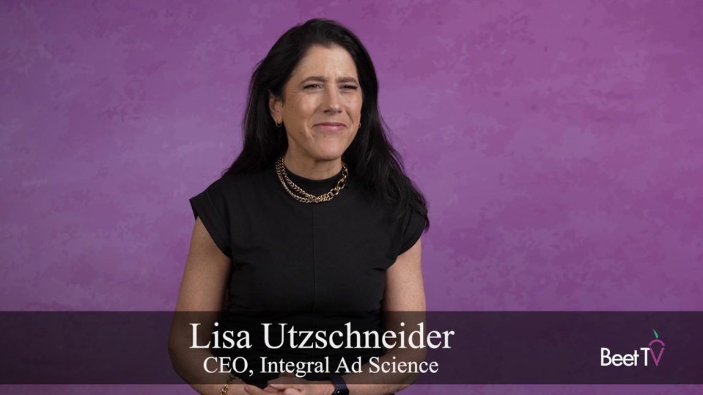 Integral Ad Science CEO Lisa Utzschneider speaking at an industry event.