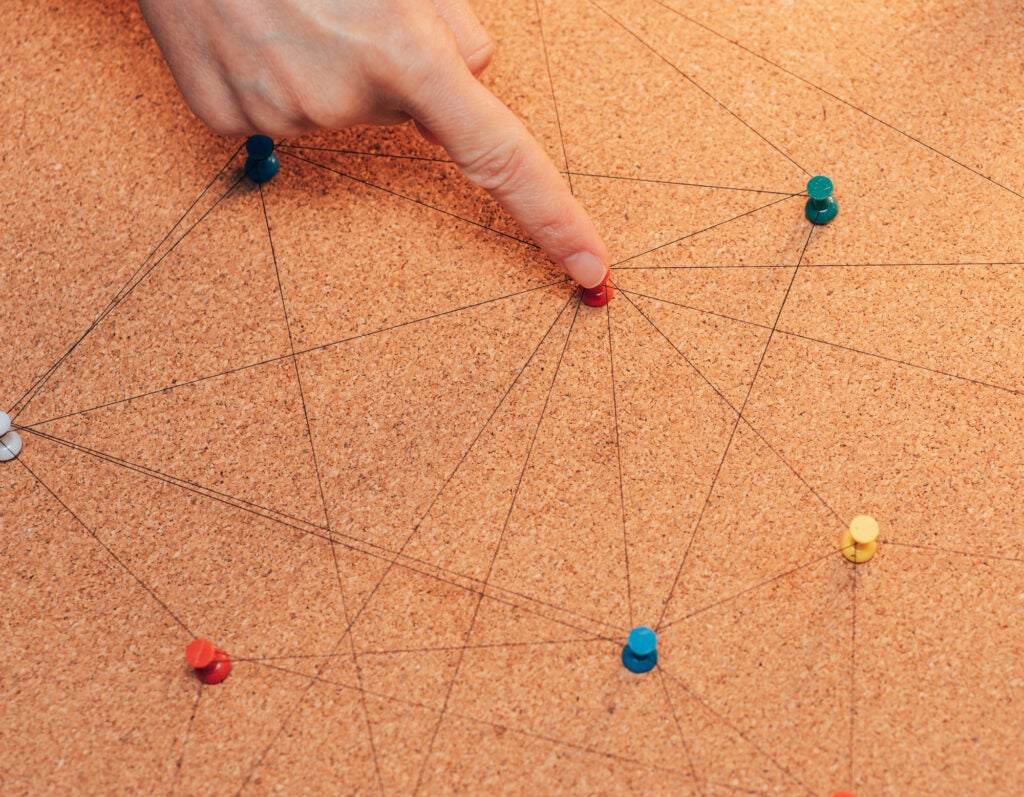 Illustration of digital agents working on data streams and charts, representing AI automation in media buying.