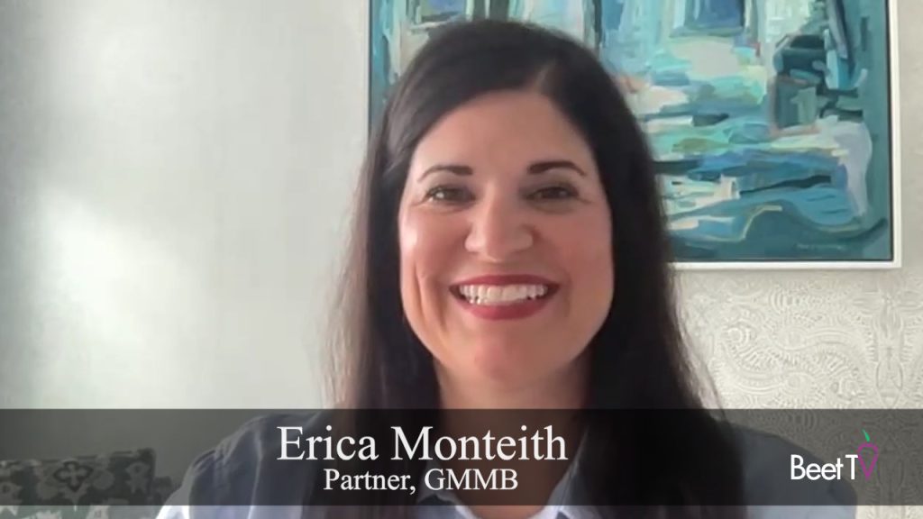 Erica Monteith speaking at a podium with a GMMB logo visible.